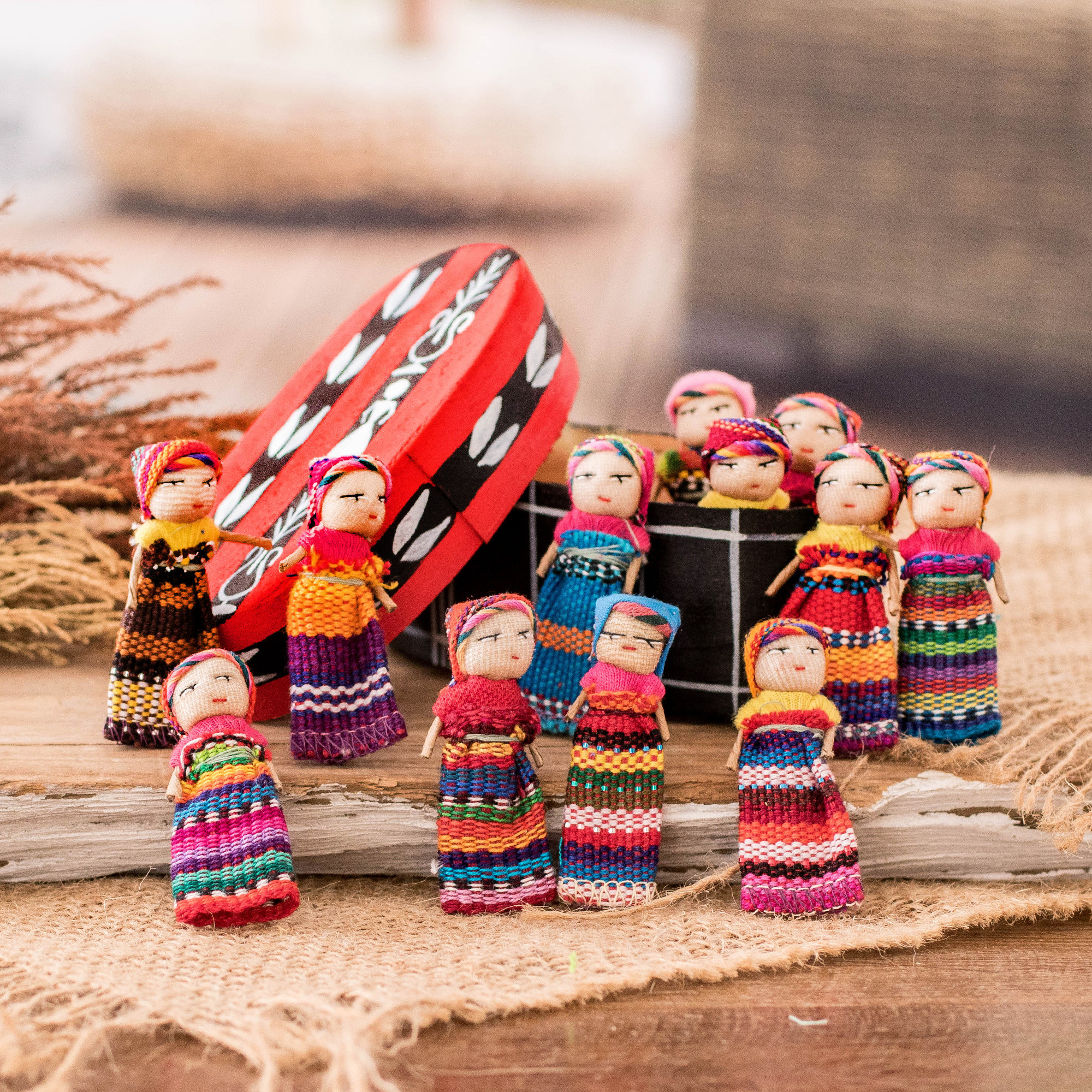 Twelve Cotton Worry Dolls with a Pinewood Box from Guatemala