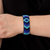 Beaded cuff bracelet, 'Blue Isle' - Blue Glass Bead Cuff Bracelet Diamond Motif from El Salvador