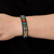 Beaded cuff bracelet, 'Floral Pacific' - Glass Beaded Cuff Bracelet Hexagon Motif from El Salvador
