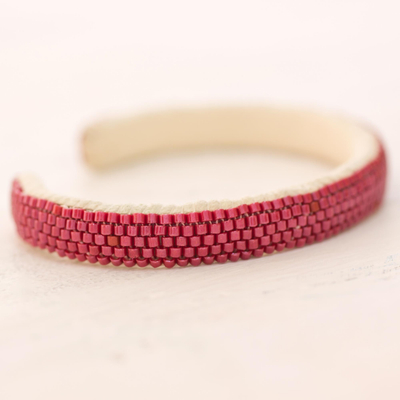 Beaded cuff bracelet, 'Beautiful Horizon in Cherry' - Glass Beaded Cuff Bracelet in Solid Cherry from El Salvador
