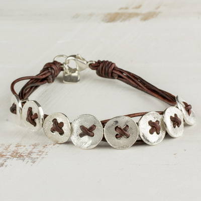 Fine silver wristband bracelet, 'Friendship Buttons in Brown' - Fine Silver and Leather Wristband Bracelet from Guatemala