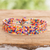 Beaded wristband bracelet, 'Multicolored Happiness' - Multicolored Glass Beaded Wristband Bracelet from Guatemala