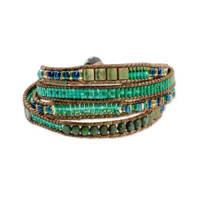 Glass beaded wristband bracelet, 'Glistening Lake' - Glass Beaded Wristband Bracelet in Cerulean from Guatemala