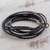Leather wrap bracelet, 'Elegance and Style in Black' - Braided Leather Wrap Bracelet in Black from Guatemala thumbail