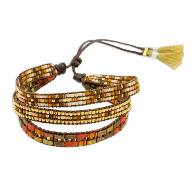 Glass beaded wristband bracelet, 'San Pedro Sunset' - Adjustable Glass Beaded Wristband Bracelet from Guatemala