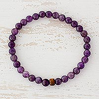 Amethyst beaded stretch bracelet, 'Rain of Purple' - Amethyst and Pinewood Beaded Stretch Bracelet from Guatemala