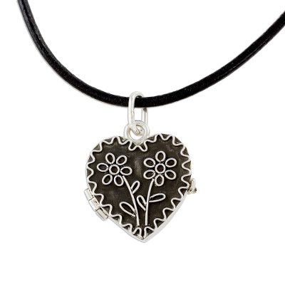 Sterling silver locket necklace, 'Protected by Love' - Heart-Shaped Sterling Silver Locket Necklace from Guatemala