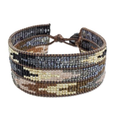 Glass beaded wristband bracelet, 'Mountain Guide' - Arrow Motif Glass Beaded Wristband Bracelet from Guatemala
