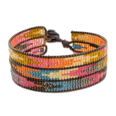 Glass beaded wristband bracelet, 'Colorful Guide' - Colorful Arrow Motif Glass Beaded Bracelet from Guatemala