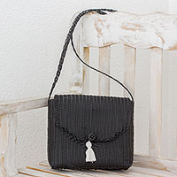 Handwoven shoulder bag, 'Classic Panther' - Handwoven Recycled Plastic Sling in Black from Guatemala