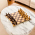 Wood chess set, 'Twisted Battle' - Tempisque and Salmwood Chess Set from Nicaragua