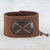Leather wristband bracelet, 'Powerful' - Brown Leather Coconut Shell Pendant Wristband Bracelet thumbail