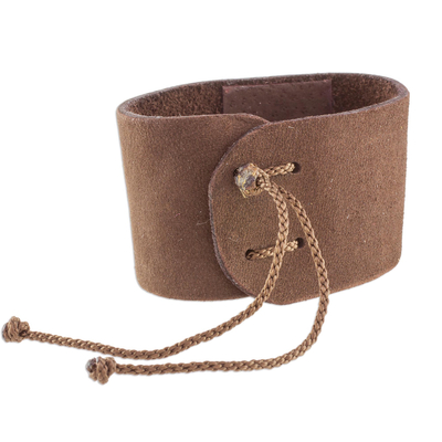 Leather wristband bracelet, 'Powerful' - Brown Leather Coconut Shell Pendant Wristband Bracelet