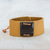 Leather wristband bracelet, 'Energetic' - Mustard Leather Coconut Shell Pendant Wristband Bracelet thumbail
