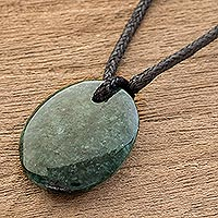 Jade pendant necklace, 'Ancient Strength' - Green Jade Pendant Necklace with Cotton Cord