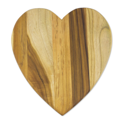 Teak wood cutting board, 'Heart of Cooking' - Heart-Shaped Teak Wood Cutting Board from Guatemala