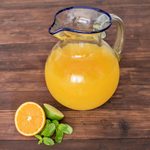 Recycled glass pitcher, 'Clear Seas' - Clear Blue Rimmed Hand Blown Recycled Glass Pitcher