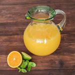 Recycled glass pitcher, 'Palm Beach' - Clear Green Brown Hand Blown Recycled Glass Pitcher