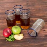 Recycled glass tumblers, 'Clear Seas' (set of 4) - Clear Blue Rim Hand Blown Recycled Glass Tumblers (Set of 4)