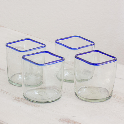 Recycled glass juice glasses, 'Lakeside' (set of 4) - Blue-Rimmed Clear Recycled Glass Juice Glasses (Set of 4)