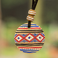 Wood pendant necklace, 'Wise Maya' - Pinewood Pendant Necklace with Mayan Motifs from Guatemala