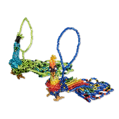 Glass beaded ornaments, 'Real Beauty' (pair) - Hand-Beaded Glass Peacock Ornaments from Guatemala (Pair)