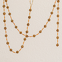 Glass beaded garland, 'Golden Silhouettes' - Glass Beaded Garland in Orange from Guatemala