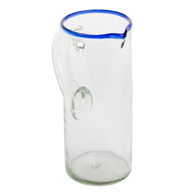 Glass pitcher, 'Clear Waters' - Handblown Recycled Glass Cylindrical Pitcher with Blue Rim