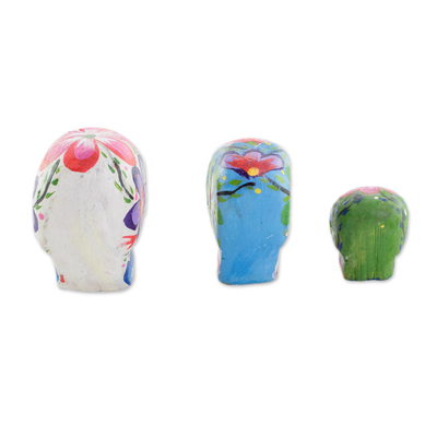 Wood figurines, 'Life and Color' (set of 3) - Wood Floral Skull Figurines from Guatemala (Set of 3)