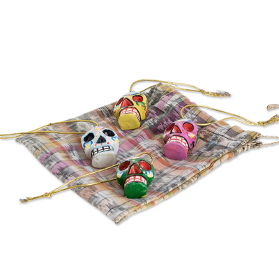 Wood ornaments, 'Traditional Skulls' (set of 4) - Wood Floral Skull Ornaments from Guatemala (Set of 4)