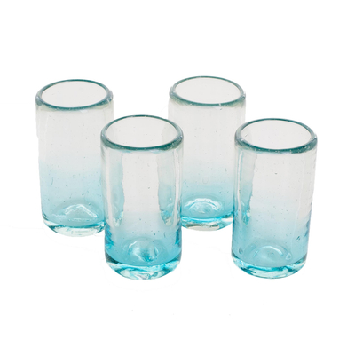 Recycled glass shot glasses, 'Glistening Sea' (set of 4) - Recycled Glass Shot Glasses in Blue (Set of 4)