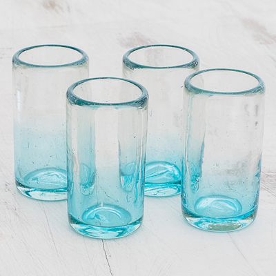Recycled glass shot glasses, 'Glistening Sea' (set of 4) - Recycled Glass Shot Glasses in Blue (Set of 4)