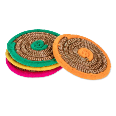 Pine needle coasters, 'Coiled Colors' (set of 4) - Multicolored Pine Needle Coasters from Nicaragua (Set of 4)
