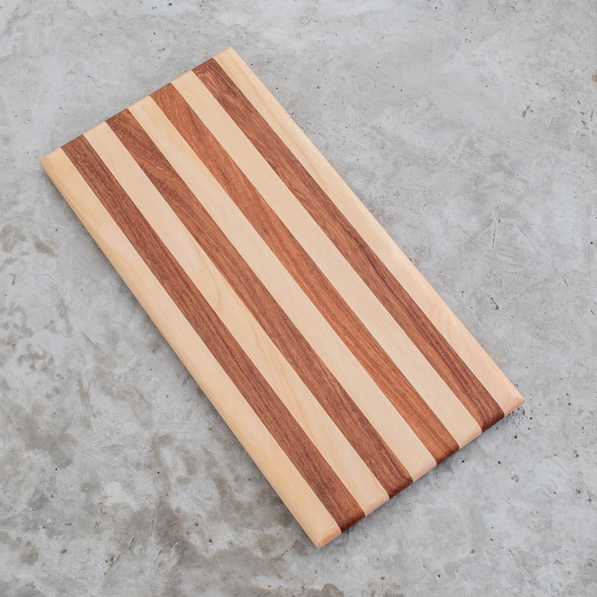 UNICEF Market Striped Cypress and Chechen Wood Cutting Board
