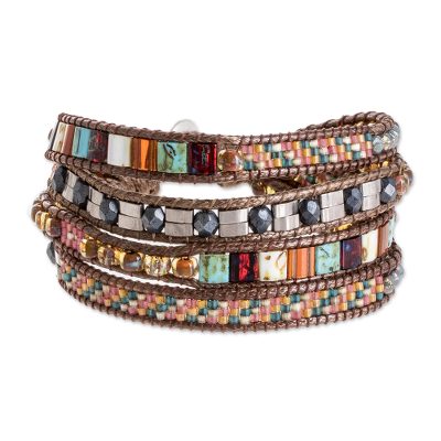 Glass beaded wristband bracelet, 'Beneath the Ocean' - Colorful Glass Beaded Wristband Bracelet from Guatemala