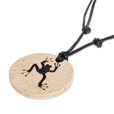Coconut shell and lava stone pendant necklace, 'Friend of the Pond' - Coconut Shell and Lava Stone Frog Pendant Necklace