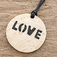 Coconut shell and lava stone pendant necklace, 'Have Love'