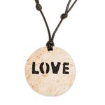 Coconut shell and lava stone pendant necklace, 'Have Love' - Love-Themed Coconut Shell and Lava Stone Pendant Necklace