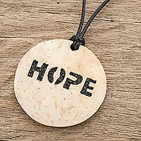 Coconut shell and lava stone pendant necklace, 'Have Hope' - Hope-Themed Coconut Shell and Lava Stone Pendant Necklace