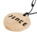 Coconut shell and lava stone pendant necklace, 'Have Peace' - Peace-Themed Coconut Shell and Lava Stone Pendant Necklace