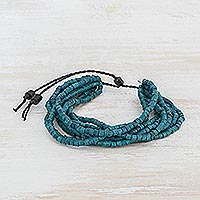 Ceramic beaded torsade bracelet, 'Harmony of Blue' - Blue Ceramic Beaded Torsade Bracelet from Guatemala