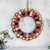 Cotton wreath, 'Quitapena Happiness' - Cotton Worry Doll Wreath from Guatemala (image 2) thumbail