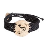 Coconut shell and lava stone macrame pendant bracelet, 'Abstract Phoenix' - Phoenix Coconut Shell and Lava Stone Pendant Bracelet