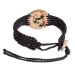 Coconut shell and lava stone macrame pendant bracelet, 'Abstract Phoenix' - Phoenix Coconut Shell and Lava Stone Pendant Bracelet