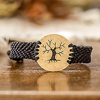 Coconut shell and lava stone macrame pendant bracelet, 'Bare Tree' - Coconut Shell and Lava Stone Tree Pendant Bracelet