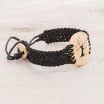 Coconut shell and lava stone macrame pendant bracelet, 'Bare Tree' - Coconut Shell and Lava Stone Tree Pendant Bracelet