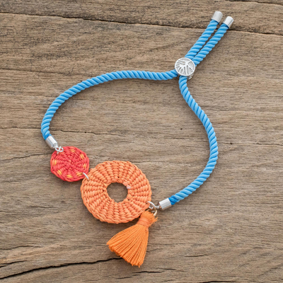 Natural fiber pendant bracelet, 'Sunset Harmony' - Orange and Blue Natural Fiber Pendant Bracelet from Honduras