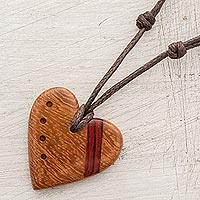 Wood pendant necklace, 'Madrecacao Heart Stripe' - Madrecacao and Estoraque Heart Necklace from Costa Rica