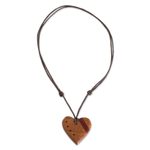 Wood pendant necklace, 'Madrecacao Heart Stripe' - Madrecacao and Estoraque Heart Necklace from Costa Rica