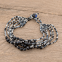 Crystal and glass beaded strand bracelet, 'Nocturnal Brilliance in Black' - Black Crystal and Glass Beaded Strand Bracelet